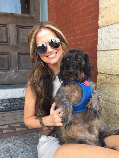 Melanie Stanley and her wire haired dachshund, Stewart Douglas Stanley. The dog has become something of a social media celebrity.