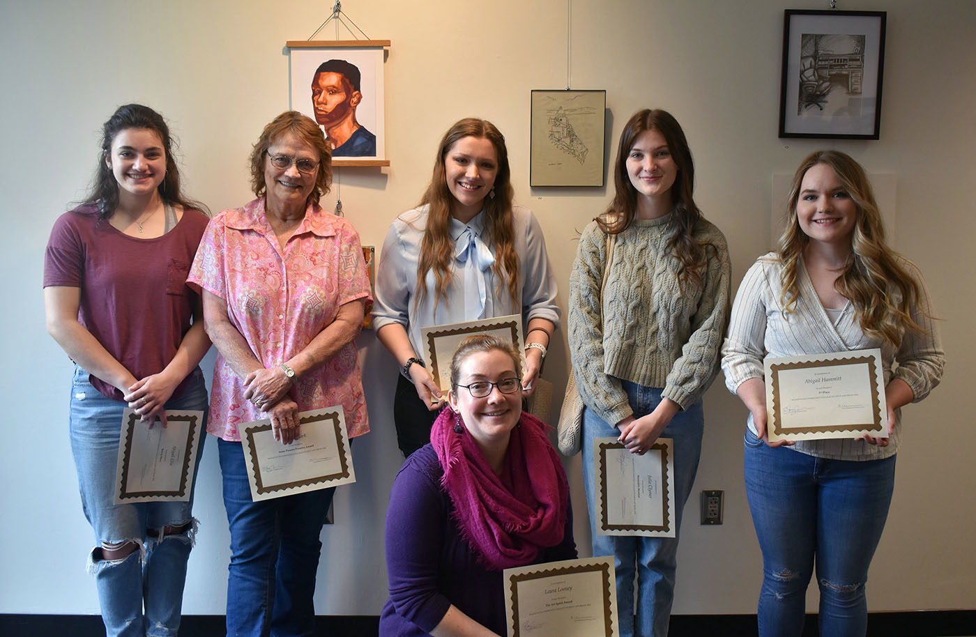 Shown are Art Department award winners and winners from Roane State’s Student Art Show. From left: Abigail Elllis, Debbee Clark representing her husband Archie Clark, Maya Collins, Julia Clymer and Abigail Hammitt. In front is Laura Looney.