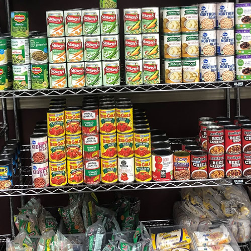 Canned and bagged food on shelves