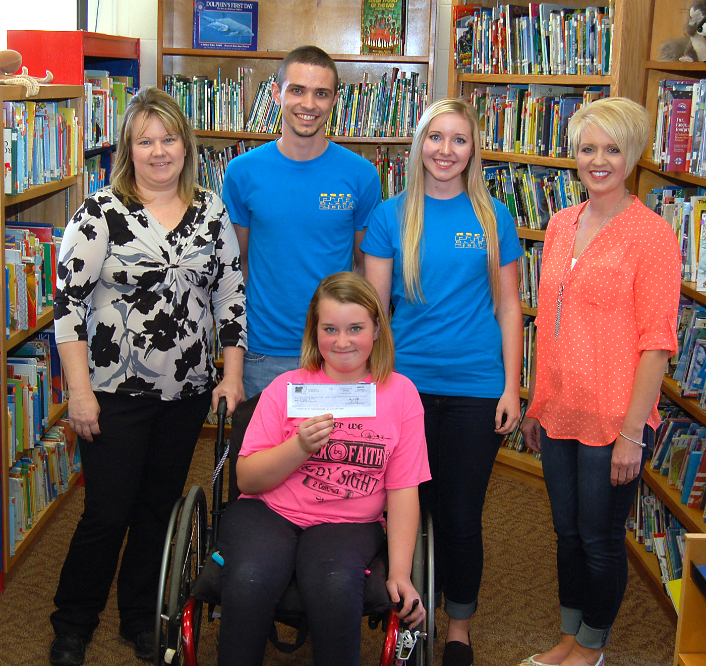 Students in Roane State’s Physical Therapist Assistant Club raised $350 to help the family of Fairview Elementary School student Jerica Stanley (front). Back, from left, are Jerica’s mother, Crystal, Roane State students Andrew Adkins and Savannah Cox, and Fairview Elementary assistant principal Gretchen Stephens.