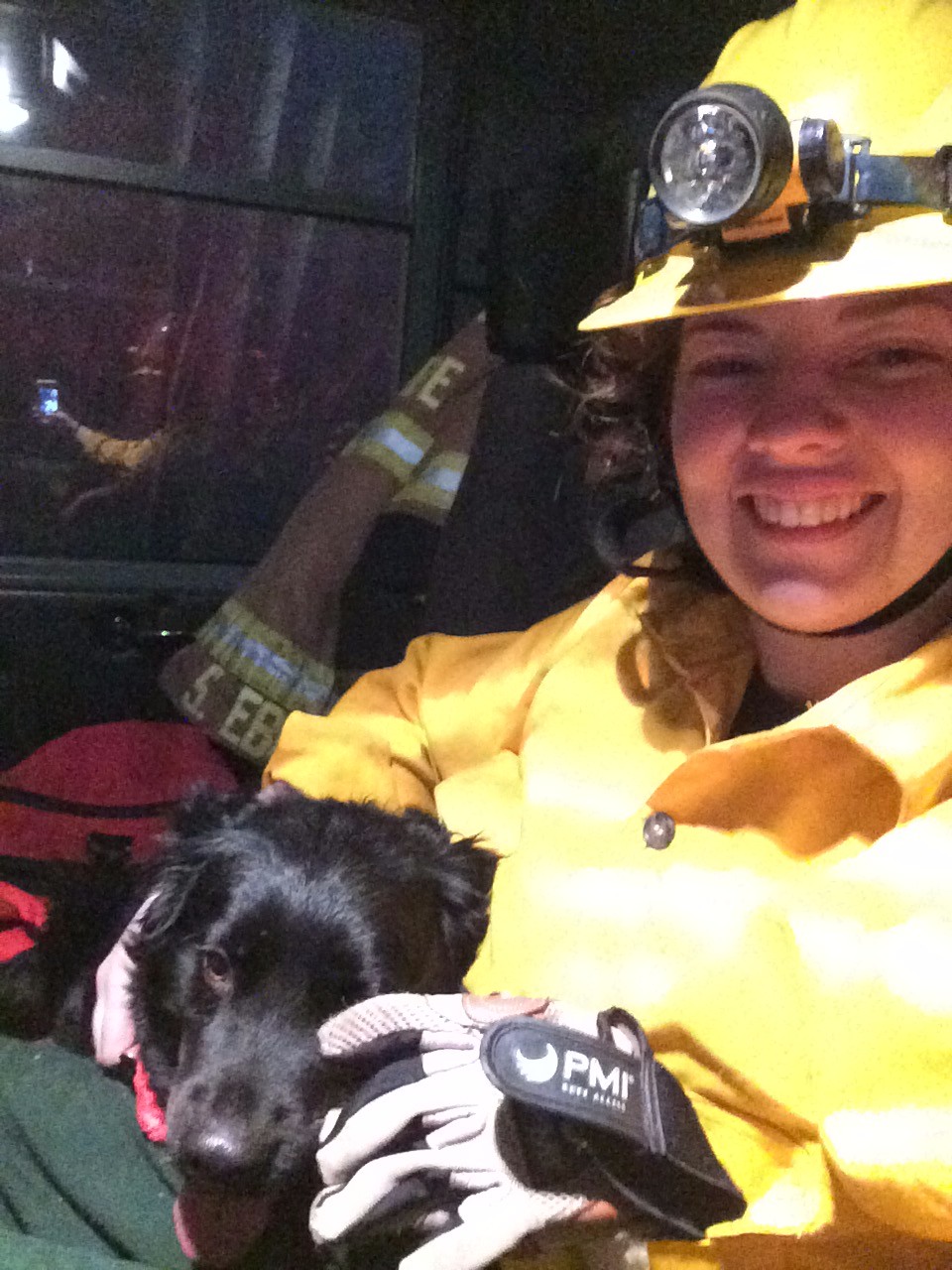 Firefighter with rescued dog