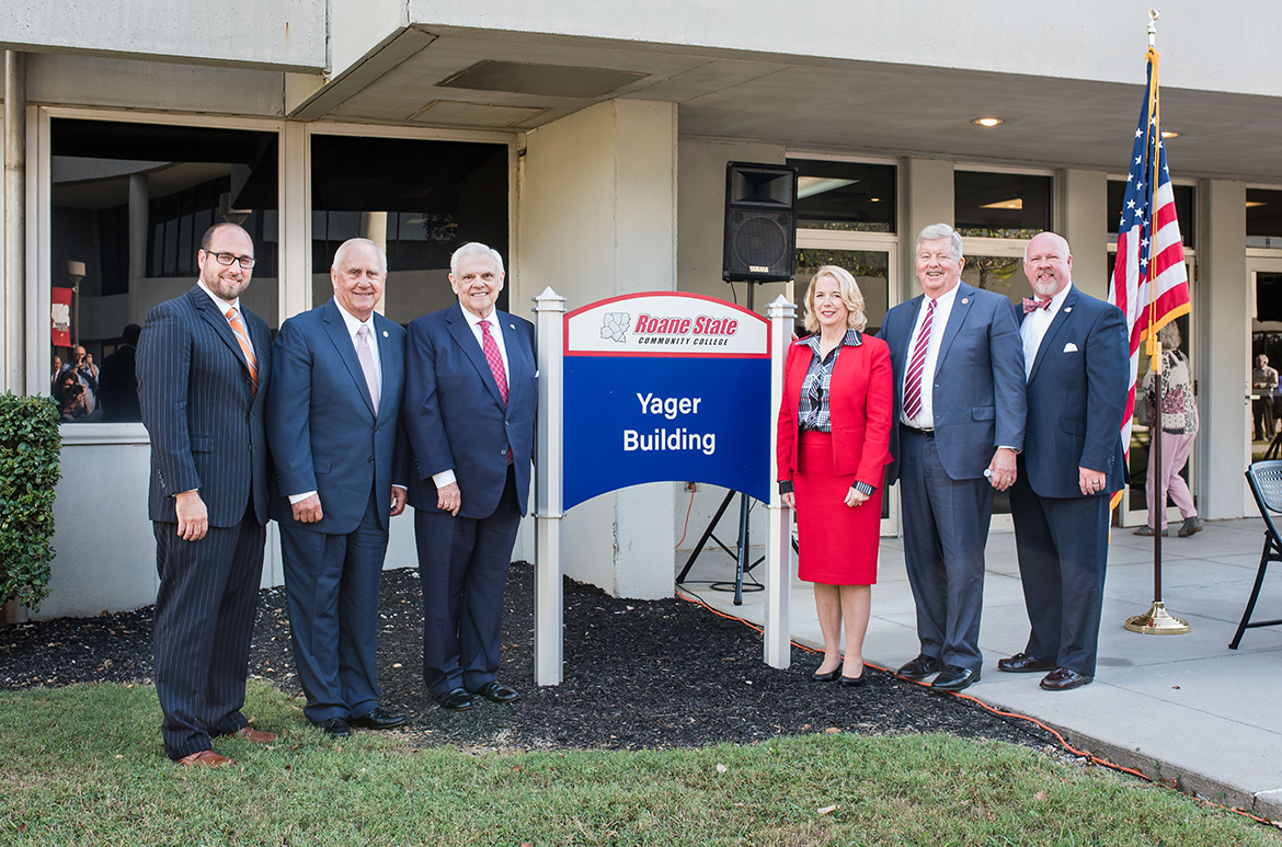 Group in front of new Yager Building sign