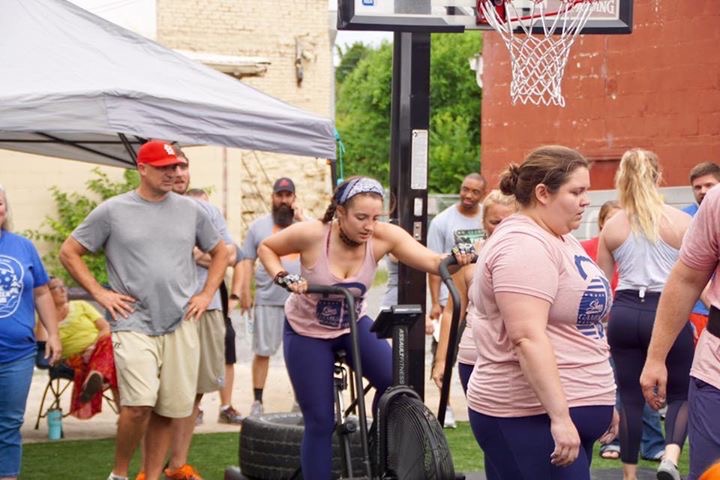 Lena Miller, a sophomore at Roane State, is pictured working out at the Dayton CrossFit facility while surrounded by other physical fitness fans.