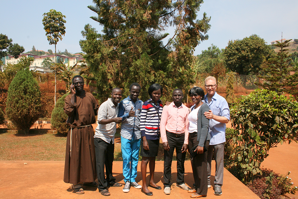 Richard Nesbit, at right, brother of Roane State Athletics Director Randy Nesbit, is shown with some of the residents of the African country of Uganda.