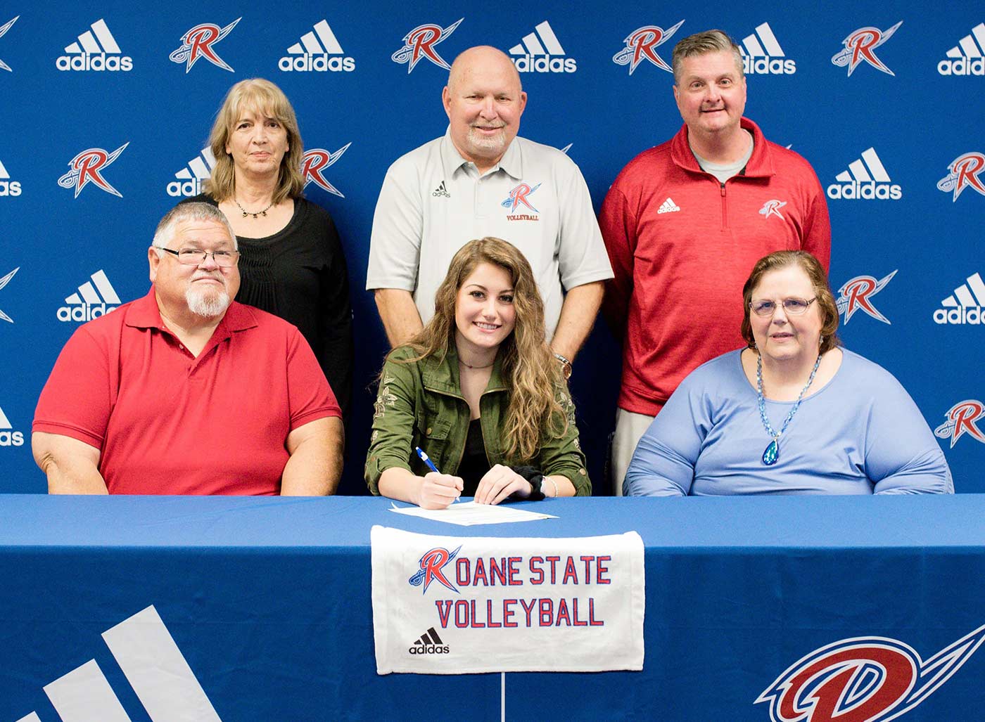 Haylee Rogers, seated, center, is the first athlete to sign with Roane State’s new women’s volleyball team and is flanked by her parents, Robert and Abbie Rogers. Standing from left: Haylee’s aunt, Teri Williams, Lady Raiders Head Volleyball Coach Steve Dallman and Roane State Athletics Assistant Scott Witt.
