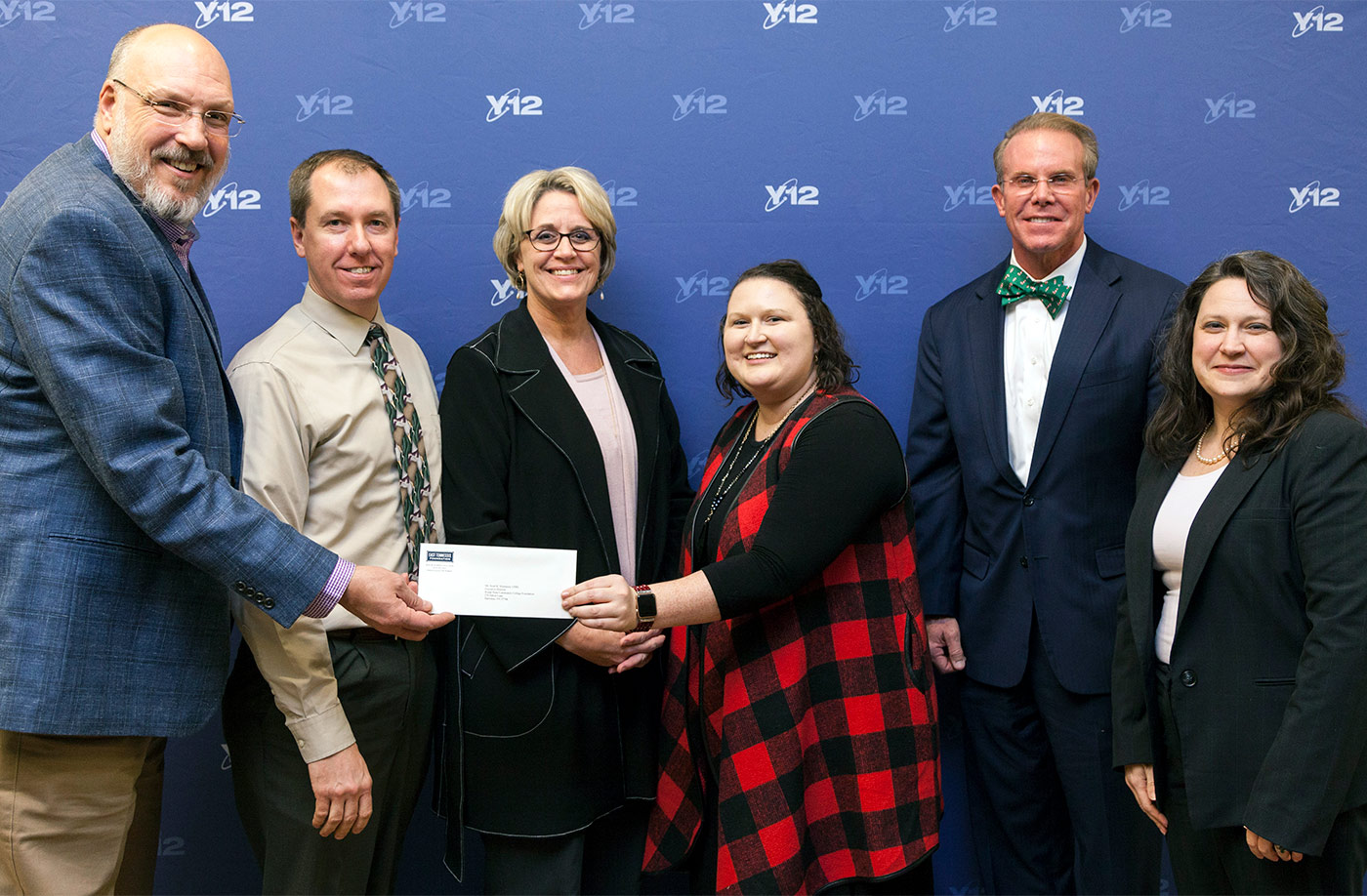 Making the grant presentation, from left: Robert Keen, chair of the Y-12 Employment Investment Advisory Committee; Scott Niermann, executive director of the Roane State Foundation; Teresa Duncan, Roane State vice president of workforce development and director of the college’s Oak Ridge Branch Campus; Meghan Lovelace, committee secretary; Mike McClamroch, East Tennessee Foundation president and CEO; and Amy Wilson, CNS senior director of transformation.