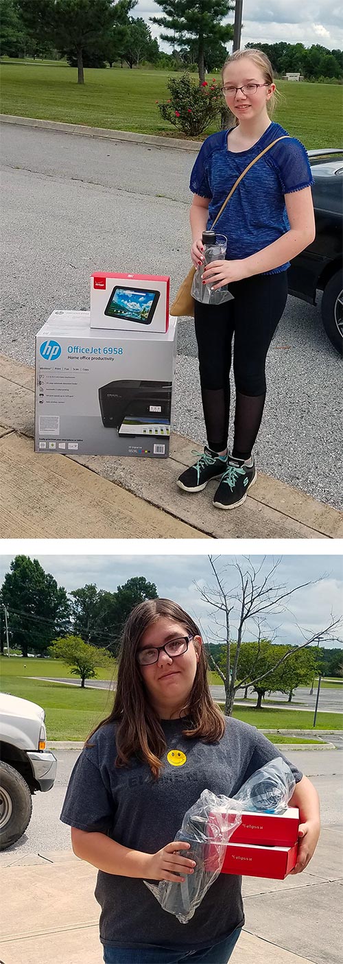 Kaylee Hoskins and Haley Sexton with items awarded from STEM camp