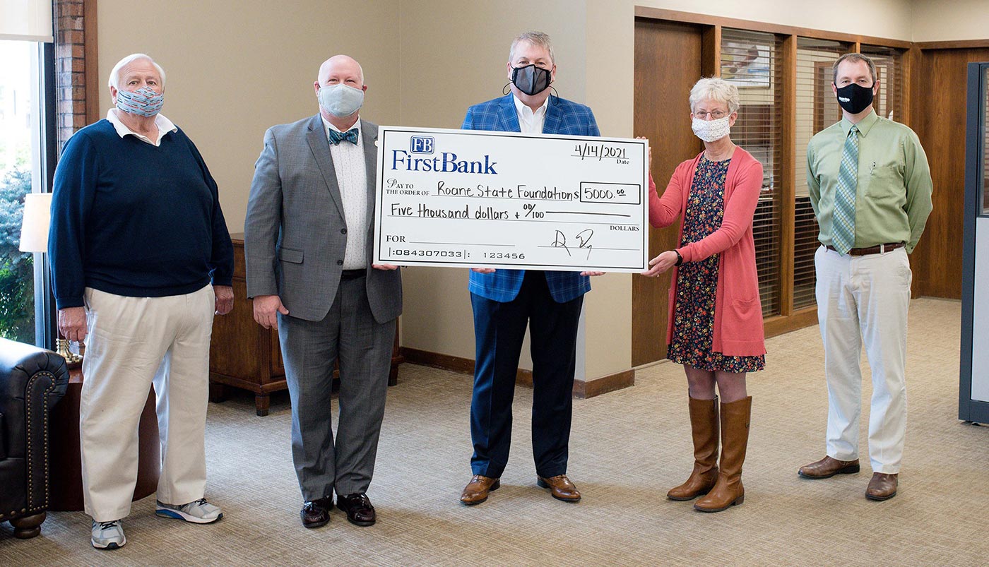 Roane State Community College representatives accept a donation from FirstBank that will help support dual enrollment students in Cumberland County. Pictured left to right are: Pepe Perron, Roane State Foundation board member; Dr. Chris Whaley, Roane State President; Doug Parkey, FirstBank Senior Vice President; Holly Hanson, Roane State Cumberland County Campus Director; and Scott Niermann, Executive Director of Roane State Foundation.