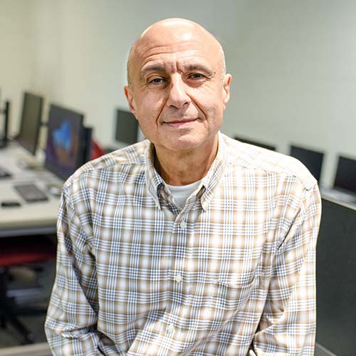 Dr. George Meghabghab in a computer lab