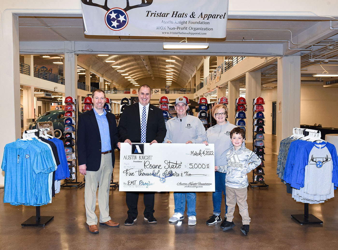 The Austin Knight Foundation presents a $5,000 donation to Roane State Foundation in support of the community college’s EMS program. Pictured left to right are Scott Niermann, executive director of Roane State Foundation; David Blevins, Roane State EMS program director; William “B.J.” Hillard, Amanda Hillard and son Finn.