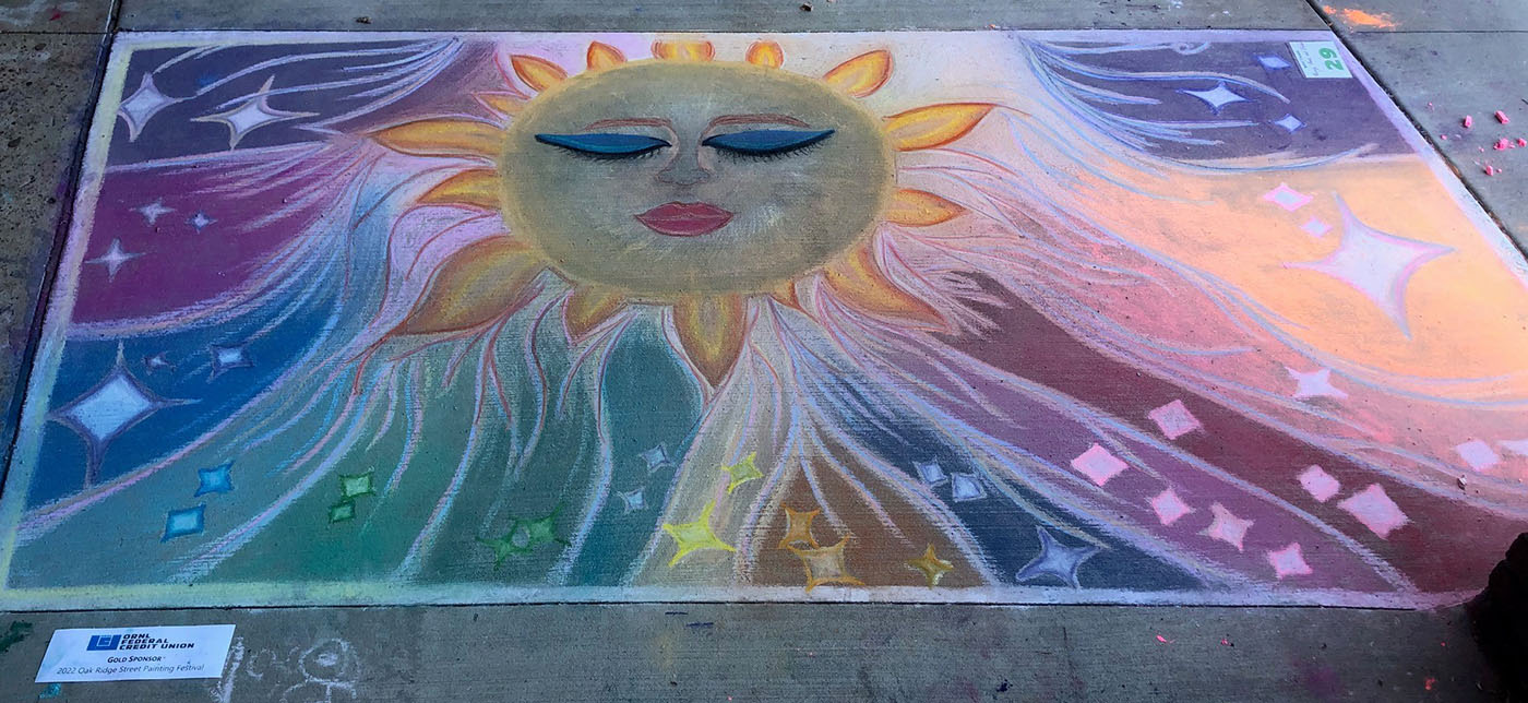 Painting of a sun with multiple colors behind it