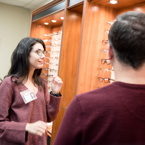 A Roane State Vision Care Technology student works with a visitor in the program's campus vision clinic.