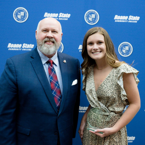 Leah Cobble, the 2023 recipient of the President's Award, stands with RSCC President Chris Whaley following the announcement at Academic Awards Night.
