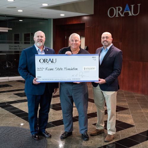 ORAU presents Roane State with a check for $100,000 in support of the new campus in Knoxville.