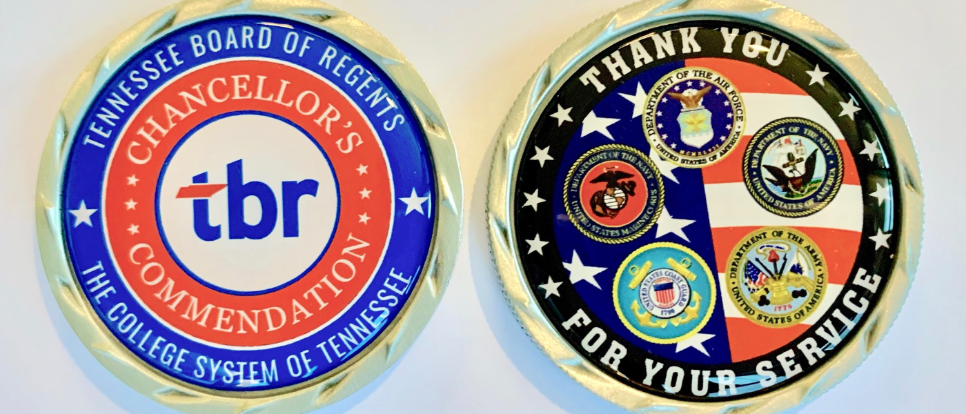 Front and back view of a challenge coin.