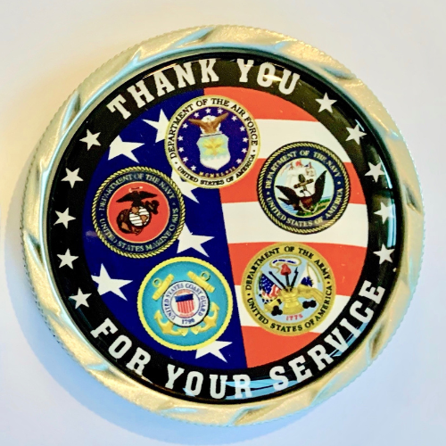 A close-up of the chancellor's commendation coin, which includes the inscription "Thank you for your service."