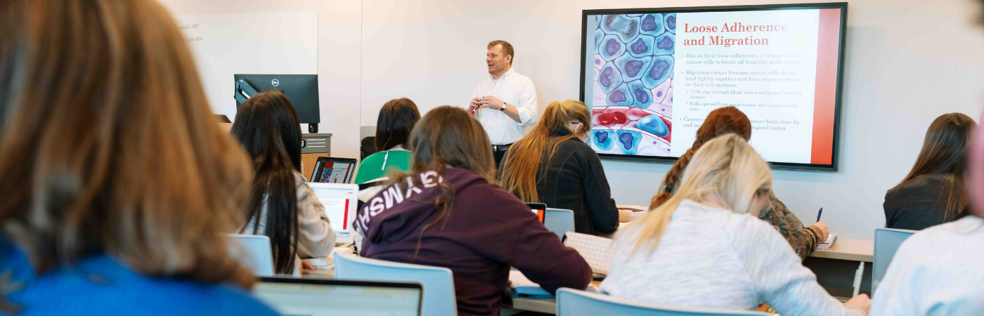 Students in a health science class at a college campus.