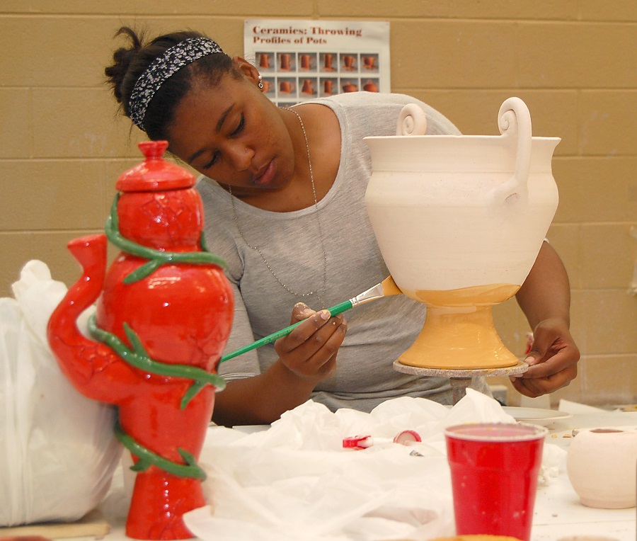  Oak Ridge High School junior Tamia Soles paints a piece during Roane State’s dual credit ceramics class at Oak Ridge High School.