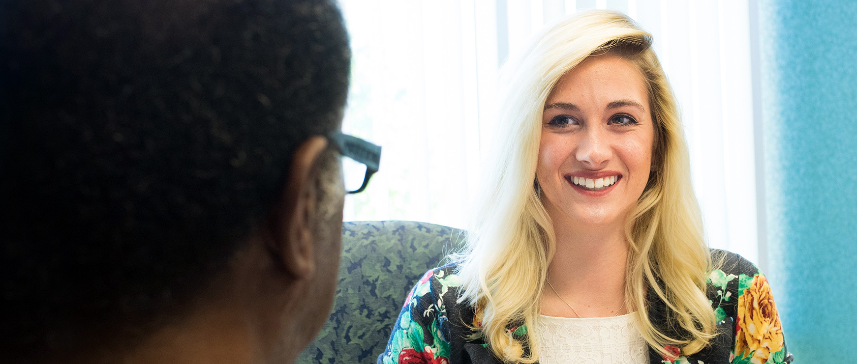 Student speaking with an employer