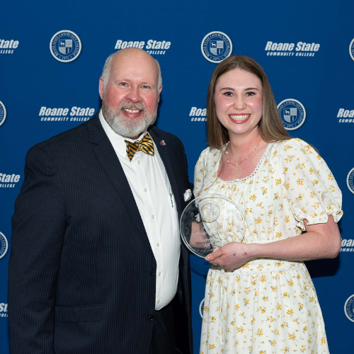 A student with an award.